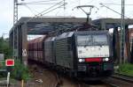 Coal train headed by 189 455 crosses the bridge adjacent to Celle station on 8 September 2015.