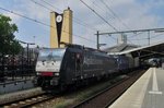 MRCE 189 284 hauls an intermodal htrough Tilburg on 9 July 2016.