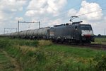 LOCON 189 099 hauls a tank train past Horst-Sevenum on 18 July 2016.