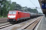 GATX tank train passes Dordrecht Centraal on 23 July 2016, being hauled by 189 023.