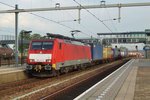 Intermodal service with 189 035 speeds through Lage Zwaluwe on 20 July 2016.