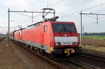 Coal train with 189 038 thunders through Lage Zwaluwe on 20 July 2016.