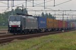 SBB Cargo 189 288 passes through a little hazy Lage Zwaluwe on 22 September 2016.