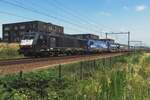 Ecco raoil 189 285 hauls an SBBCI container train through Tiulburg-Reeshof on 23 July 2021.