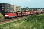 DBC 189 041 hauls an empty iron ore train through Tilburg Reeshof on 23 July 2021. Mostly, iron ore trains are hauled by two 189s, but an empty train is much lighter than a filled one and one loco can do that job.