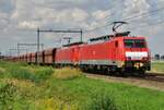 Iron ore train passes through Horst-Sevenum on 18 July 2016, being hauled by 189 038 in front.