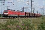 DBC 189 038 hauls a sister loco and an empty iron ore train through Valburg on 23 July 2020.