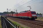 On 22 August 2018 DBC 189 034 hauls an iron ore train through Venlo Vierpaardjes and is about to pass a railway crossing. After decades of fuzzing to and fro, finally the railway crossing will make place for a short tunnel, wiping out half of the neighbourhood in the proces -and ending photo possibilities on this erstwhile famous vantage spot.