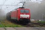 On a very misty 23 October 2023 DBC 189 075 hauls a tank train through Emmerich.