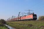 DBC 189 066 hauls a coal train through Angeren toward Germany on 24 October 2024.