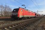 On 15 February 2023 DBC 189 086 takes a break at Blerick with the FORD automotive train to Vlissingen-Sloehaven. This photo was made from a public cycle path.