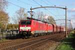 On 4 November 2020 DBC 189 030 hauls an empty iron ore train through Hulten toward the Rotterdam port area, where the wagons will be filled with ore from Brazil or Australia. 