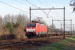 DBC 189 026 hauls a steel train through Wijchen on 29 January 2019.