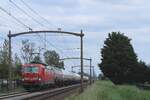 DBC 193 346 hauls a tank train to Vlissingen Sloehaven through Hulten on 5 June 2024.