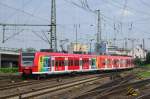 426 538 with advertising livery leaves Koblenz Hbf on 2 June 2012.