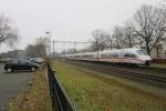 ICE 406 002 speeds through Wijchen on 6 December 2013.