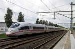 ICE 406 002 speeds through Zevenaar on 31 August 2014.