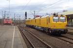 DB Bahnbau 719 302 leaves Hannover Hbf on 4 April 2018. 