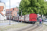 The train winds its way through the streets of Bad Doberan on the Mecklenburgische Bäderbahn between Bad Doberan and Kühlungsborn. Date: 8th June 2025.