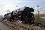 Steam train, headed by 01 0509 leaves a sunlit Pirna on 12 April 2014.