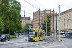 Tram 671 from RSAG (Rostocker Straßenbahn AG) on Line 6 leaving Lange Straße in Rostock.