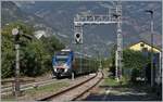 The FS Trenitalia MD ALn 502 056  Minutto  (95 83 4502 056-3 I-TI) reaches Verres station as a regional train from Aosta to Ivrea.