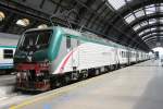 TreNord -a constorium of Trenitalia and FNM- 464 196 at Milano Centrale on a sunny 1 July 2013.