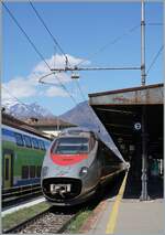 FS Trenitalia ETR 610 003 patiently waits in Domodossola as EC 142 Domodossola - Geneva for departure.