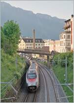 The FS Trenitalia ETR 610 011 as an EC from Geneva to Domodossola, shortly after Montreux, on its way to Brig.
