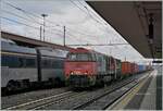 The FER (Ferrovie Emilia Romagna) G2000.22 with a cargo train in Parma.