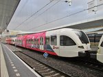 Arriva 262 quits Arnhem Centraal on 27 April 2016, sporting colours advertising the start of the Giro d'Italia in the Dutch province of Gelderland.
