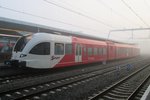 In a foggy Arnhem Arriva 369 stands ready for departure on 23 October 2016.