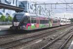 Veolia 202 in Floriade-advertising livery enters Nijmegen Centraal on 12 August 2012.

