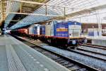 On 24 October 2013 Volker Rail 203-1 halts at Amsterdam Centraal. 