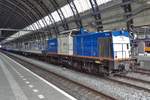 Volker Rail 203-5 stands at Amsterdam Centraal with an engineering train on 9 July 2018. 