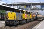 NS 6434 passes through Dordrecht Centraal toward Kijfhoek yard on 26 June 2012.