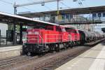 Tank train headed by 6469 passes through Dordrecht Centraal on 18 June 2013.