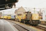 On 15 January 2001 NS 6453 with engineering train passed through Arnhem CS.