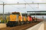 On 7 August 2009 NS 6486 with iron ore train to Kijfhoek speeds through Lage Zwaluwe.