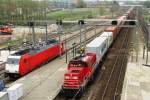 Container train headed by 6422 speeds on 4 April 2014 through Breda.