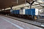 Tank train with LTE 6409 pauses at Rotterdam Centraal on 26 March 2017.