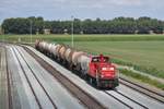 Panoramic view on Lage Zwaluwe with 6464 and lime slurry train on 18 July 2018.