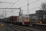 On a murky 15 December 2024 VSM's Bisshop 2530 hauls a speical train into Nijmegen.