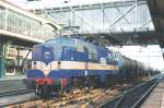 Scanned picture of ACTS/HUSA 1254 with tank train in 's Hertogenbosch on 27 July 2004.