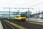 NS 1826 speeds with a pilgrims train to Lourdes through Boxtel on 25 July 2008.