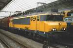 Steel train with NS 1602 takes a break at Amsterdam CS on 12 August 1997.
