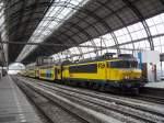 NS 1706 with commuter train at Amsterdam Centraal on 7 May 2010.