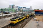 Top shot of NS 1712 with commuter stock at Rotterdam Centraal on 7 May 2010.