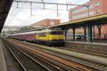 NS 1742 with red, white and green graffiti in the grille- enters 's Hertogenbosch with an EETC night train to Livorno (Italy) on 24 May 2013.