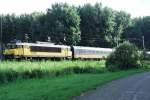 ON a sunny 8 August 2013 NS 1740 pushes an IC to Roosendaal out of Nijmegen-Dukenburg.